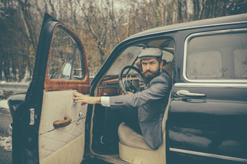 Travel and business trip or hitch hiking. Escort man or security guard. Call boy in vintage auto....