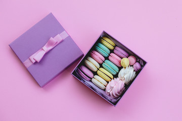 Gift box with macaroons and marshmallows