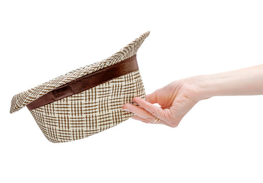 Hand Holding Summer Hat. Isolated On White.