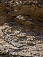 Stone background, rock wall backdrop with rough texture