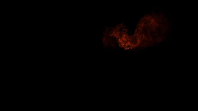 Fire flames explosion on black background. Slow motion, side view