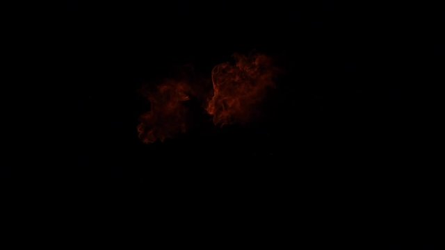 Fire flames explosion on black background. Slow motion, side view
