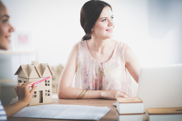 Attractive businesswoman sitting in the office. businesswoman