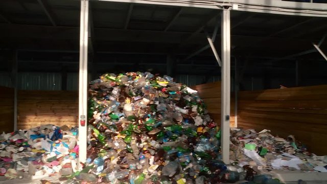 Processing of waste, garbage. Urban landfill. Sorting. Montain garbage. Ecology.