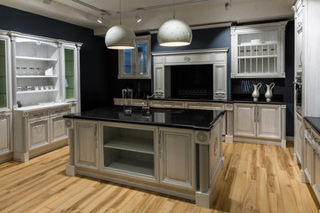 Renovated kitchen interior in dark tones