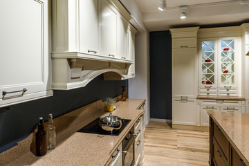Stylish kitchen with with vintage style counter and stove