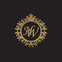 Fototapeta na wymiar Initial letter HW, overlapping monogram logo, decorative ornament badge, elegant luxury golden color