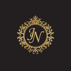 Initial letter JN, overlapping monogram logo, decorative ornament badge, elegant luxury golden color