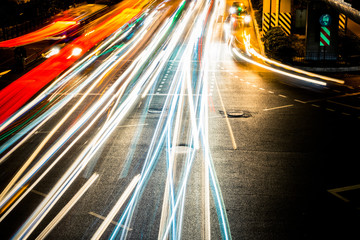 Fototapeta na wymiar moving car with blur light through city at night