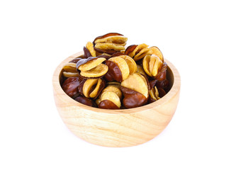 Vicia faba in wood bowl on white background