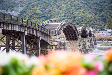 Beautiful Wooden bridge with flower in spring season 