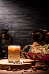 alcohol cocktail with coffee on wooden board on table