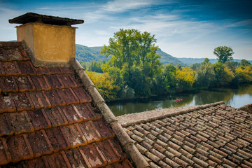 Fototapeta na wymiar Beautiful rural landscape. View of the river from the roof of the house. Silence and rest, time to rest, the best view