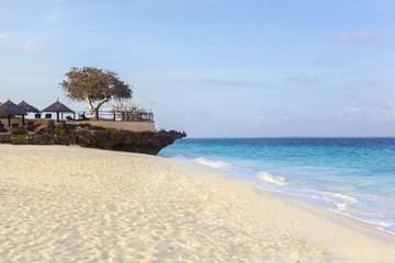Fototapeta na wymiar Sandy beach on a tropical island.