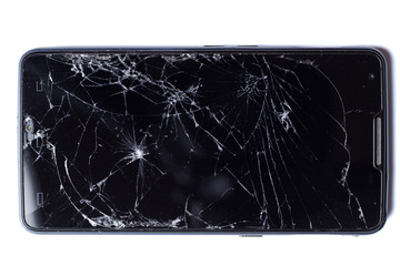 Broken smartphone screen. On white.