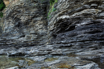 Multistory layered rough and sedimentary rocks in famous tourist site Chaeseokgang Coast in Buan-gun, South Korea.