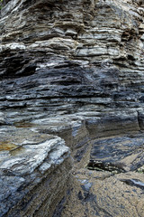 Multistory layered rough and sedimentary rocks in famous tourist site Chaeseokgang Coast in Buan-gun, South Korea.