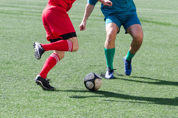 Obraz premium soccer players dribbling