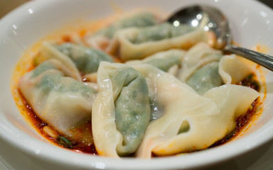 Spicy wonton soup of dumpling in a plate