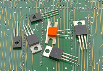 Closeup detail of transistors on circuit board