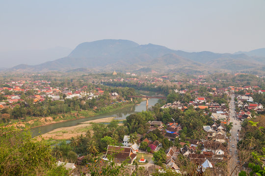 The city of Luang Prabang in Laos viewed from above from the Mount Phousi (Phou Si, Phusi, Phu Si) on a sunny day.