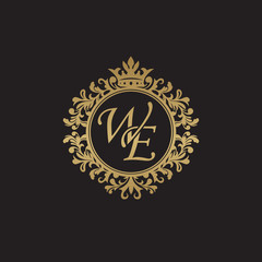 Initial letter WE, overlapping monogram logo, decorative ornament badge, elegant luxury golden color