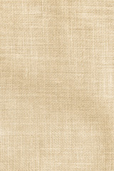Fototapeta na wymiar Hessian sackcloth woven texture pattern background in light cream yellow beige earth tone color