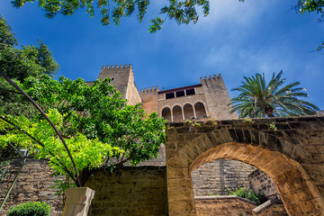 Obraz premium The Royal Palace of La Almudaina facade in Palma de Mallorca, Spain