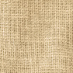 Fototapeta na wymiar Hessian sackcloth woven texture pattern background in light cream yellow beige earth tone color