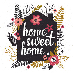 Vector illustration with black house's silhouette, floral elements and hand written text "Home sweet home". Vintage card with flowers and trendy typography.