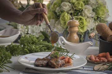 lamb steak on white plate