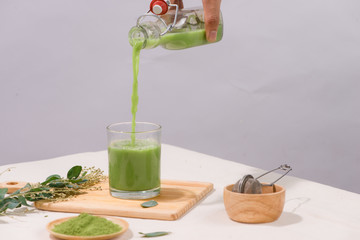 Homemade green tea, refreshing for health on white background