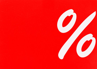 White percent sign on red background. Sale concept