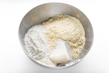 Ready-made Mexican corn tortilla: corn flour, wheat flour and butter mix in a bowl until crumbly