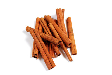 Cinnamon sticks on whte background