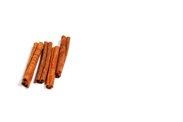 Cinnamon sticks on whte background