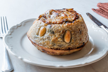 Turkish Perde Pilavi / Drape pilaf with chicken, almond and raisin / Pilav