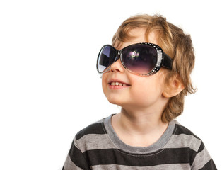 Portrait of cute toddler wearing sunglasses. Isolated on white