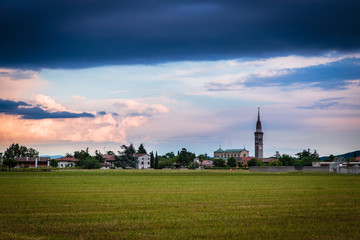 Evening storm over the medieval village