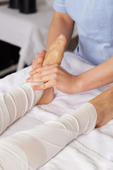 Fototapeta na wymiar thai foot massage in spa club