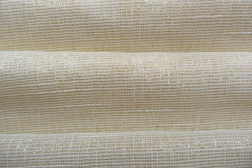 gold fabric brocade organza silk beige brown lurex fabric structure closeup background backdrop...