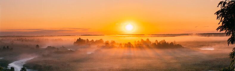 Amazing Sunrise Over Misty Landscape. Scenic View Of Foggy Morning - obrazy, fototapety, plakaty