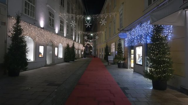 Christmas trees and lights on a street