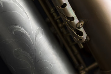 Vintage saxophone on a black background