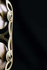 Vintage saxophone on a black background