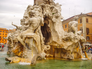 Fototapeta na wymiar Details of the famous Dei Quattro Fiumi Fountain, Rome, Italy. Fountain created in 1651 by Gian Lorenzo Bernini.