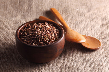 buckwheat grains and spoons