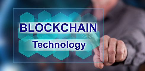 Man touching a blockchain concept