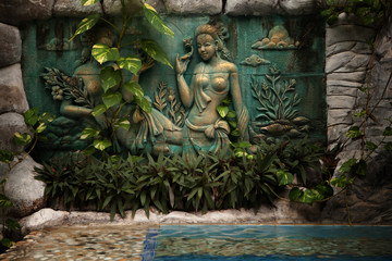 bali style decorated wall in tropic summer environment
