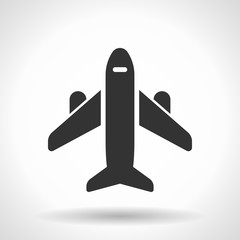 Monochromatic plane icon with hovering effect shadow on grey gradient background. EPS 10